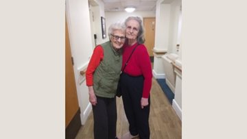 Friends enjoy walk together at Burntwood care home